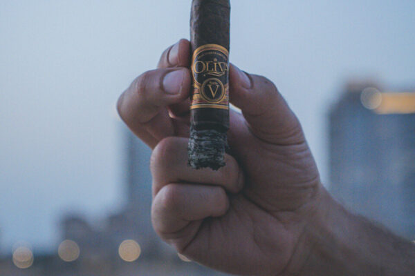 Man-Holding-Cigar Man-Holding-Cigar