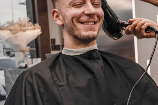 Man-Smiling-At-Barbershop Man-Smiling-At-Barbershop
