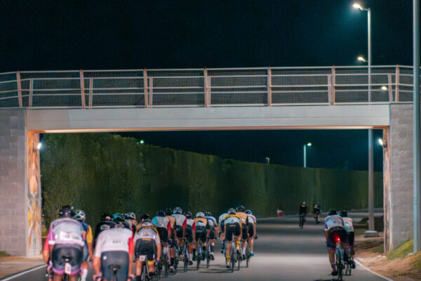 Night-Shot-Of-Racing-Cyclists Night-Shot-Of-Racing-Cyclists